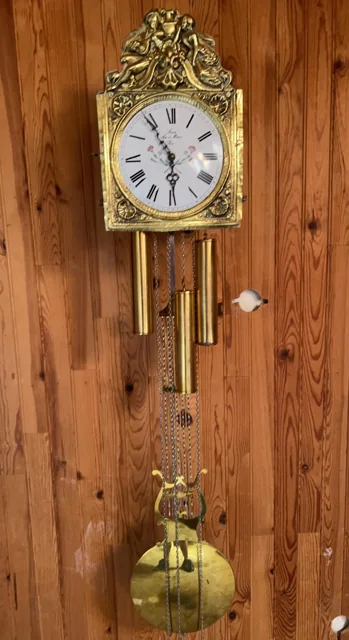 Horloge à balancier dans son meuble