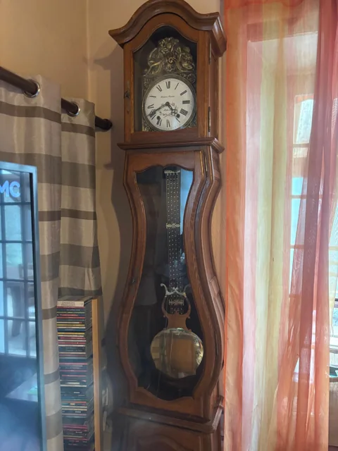 Horloge à balancier dans son meuble